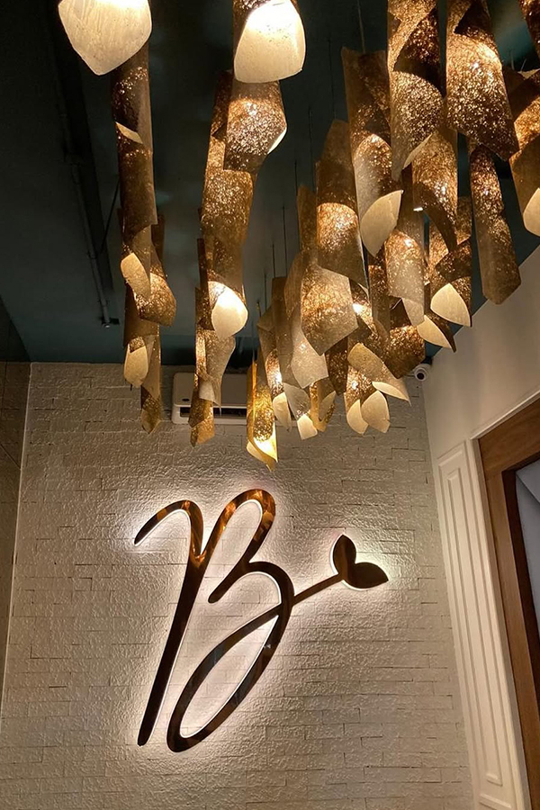 A vibrant café-bar offering a fusion of global and local cuisine with modern, Instagram-worthy interiors